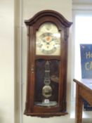 MODERN MAHOGANY CASED CHIMING GERMAN WALL CLOCK Provenance: private collection Cheshire