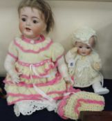TWO BISQUE HEADED DOLLS comprising a Simon and Halbig bisque headed baby doll and a Kammer &