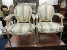 PAIR OF FRENCH GILDED CAMEO BACK ARMCHAIRS Provenance: private collection Wrexham