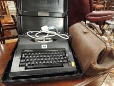 VINTAGE LEATHER GLADSTONE BAG, and a Silver Reed electric typewriter (2)