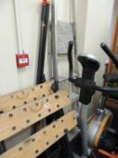 TWO WORKBENCHES, folding aluminium step ladders, exercise bicycle, tree pruner, wood axe, etc.