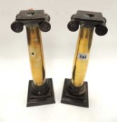 PAIR OF DECORATIVE BRASS IONIC CANDLESTICKS, 31.5cms (h)