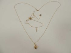 9CT GOLD FINE CHAIN NECKLACE with ball pendant, and a further 9ct fine chain necklace, gross wt. 0.