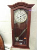 MODERN GERMAN CHIMING WALL CLOCK Provenance: private collection Flintshire
