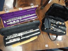 CASED ARTEMI CLARINET, Chinese lark cased flute, and an Elkhart cased flute (3) Provenance:
