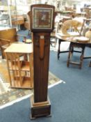 GEORGE V OAK GRANDDAUGHTER CLOCK, with Smiths Enfield movement, 141cms (h) Provenance: private