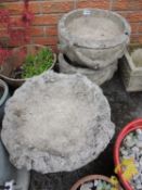 PAIR OF RECONSTITUTED STONE PEDESTAL URNS, and a reconstituted stone bird bath (3) Provenance: