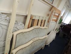 TWO ITALIAN PAINTED & UPHOLSTERED DOUBLE BEDS
