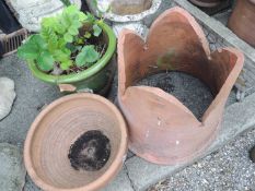 GREEN GLAZED JARDINIERE POTTED WITH A STRAWBERRY PLANT, a chimney cowl, and a stoneware