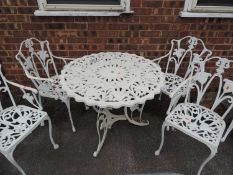 WHITE PAINTED CAST ALLOY GARDEN TABLE & CHAIRS Provenance: private collection Cheshire