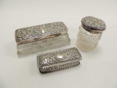 LATE VICTORIAN SILVER REPOUSSÉ PIN BOX, Birmingham 1897, 8cms, and two silver-mounted cut-glass