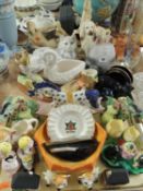 QUANTITY OF MAINLY CERAMIC ORNAMENTS, including reclining cat ornament