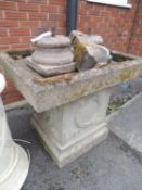 RECONSTITUTED STONE BIRD BATH, on a classical style plinth, together with two socles, and a baluster