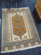 EASTERN FAWN & BROWN GROUND WOOLLEN RUG, 200 x 150cms Provenance: private collection Cheshire