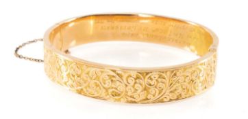 15CT GOLD HINGED BANGLE, plain and scroll engraved, the inner surface engraved 'Worsley Lodge 1814