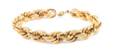 YELLOW METAL SPIRAL LINK CHAIN, plain and textured links, stamped '750', the clasp stamped '9K',