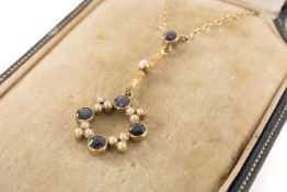 9CT GOLD SAPPHIRE & SEED PEARL DROP PENDANT on fine chain, 3.5gms in T. & J. Perry of Regent