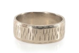 18CT WHITE GOLD WEDDING BAND, textured outer face, 9.6gms Provenance: private collection Gwent