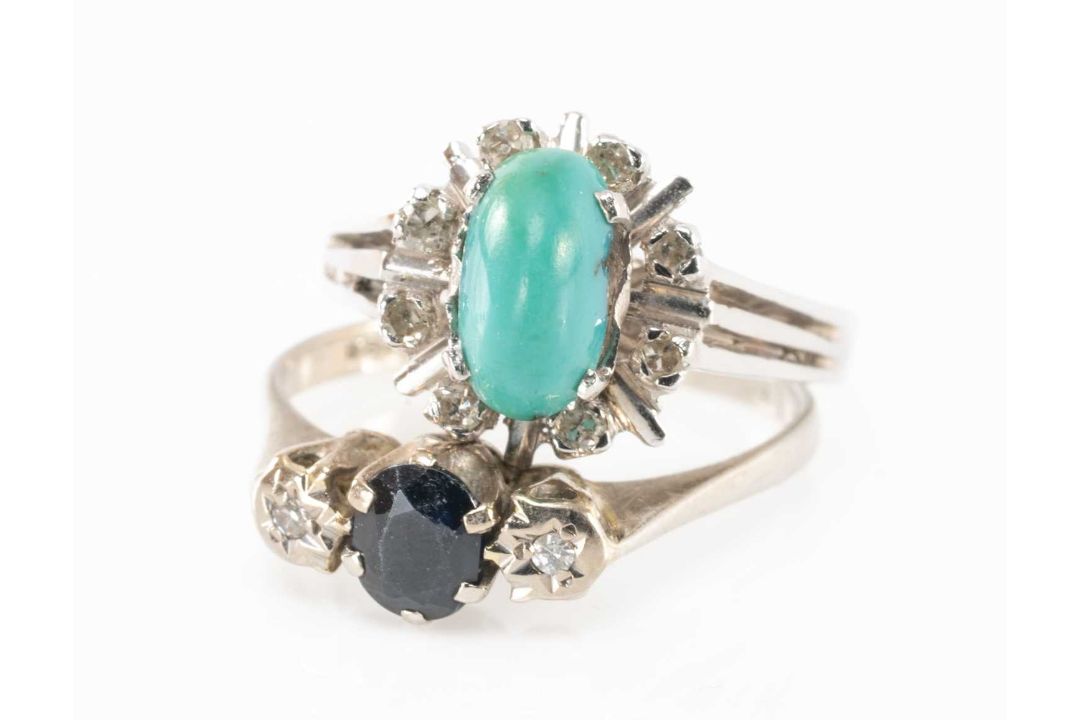 TWO 18CT WHITE GOLD RINGS comprising three stone diamond and sapphire ring and a turquoise and