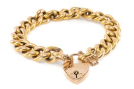 ANTIQUE 15CT GOLD CURB LINK BRACELET, heart shaped padlock, safety chain, 30.1gms Provenance: