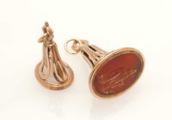 LATE GEORGE III CARNELIAN INTAGLIO SEAL FOB, mounted in unmarked yellow metal, 43mms (diam.);