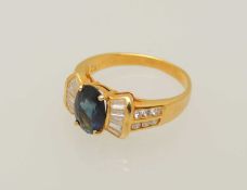 SAPPHIRE & DIAMOND CLUSTER RING, oval cut sapphire approx. 1ct, bordered with diamond baguettes,
