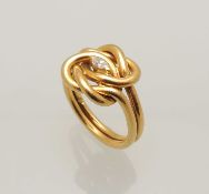 18CT GOLD KNOT RING, centred with a small marquise diamond, approx. 0.05cts, size M, 7.2g
