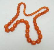 BUTTERSCOTCH AMBER BEADED NECKLACE, largest bead 20 x 16mms, approx. 115g Provenance: private
