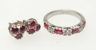 RUBY AND DIAMOND HALF ETERNITY RING, set with four rectangular cut rubies, dispersed with three