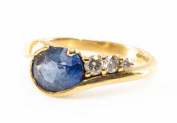 18CT GOLD SAPPHIRE & DIAMOND FOUR STONE DRESS RING, the sapphire (8 x 7 mms approx.) complimented by