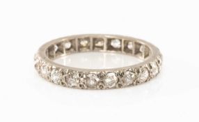 WHITE METAL DIAMOND ETERNITY RING, ring size Q 1/2, 3.5gms Provenance: private collection