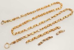 VICTORIAN YELLOW METAL FANCY CHAIN NECKLACE c. 1880, main chain 46.5cms (l), together with three