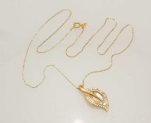 18CT GOLD DIAMOND LEAF-FORM PENDANT NECKLACE, pendant 24mms, set with baguettes and tiny brilliants,