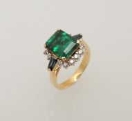 18CT GOLD GREEN STONE (UNTESTED) & DIAMOND CLUSTER RING, central stone approx. 9 x 7mms, bordered