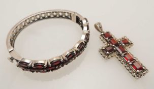 SILVER & GARNET HINGED BANGLE, cuff 57mms; silver and garnet cross form pendant, 55mms drop (2)