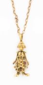9CT GOLD CLOWN MULTI-GEM SET PENDANT, on 9kt gold chain, 9.5gms Provenance: private collection