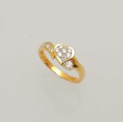 DIAMOND SWEETHEART RING, centred with a millegrain heart set with small brilliants, flanked with