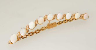 18CT GOLD OPAL & DIAMOND BRACELET, set with nine uniformly sized cabochon opals, each approx. 8 x