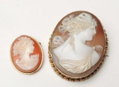 TWO 9CT GOLD MOUNTED CAMEO BROOCHES, the larger carved with a profile of the goddess Diana, 47mm (