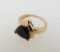 14CT GOLD BLACK ONYX DRESS RING, triangular-cut stone approx. 10 x 10mms, in three-claw mount,