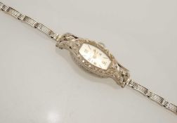 SWISS PLATINUM & DIAMOND LADY'S COCKTAIL WATCH, movement signed Hefix Watch Co., case set with