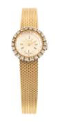 LADIES' GLYCINE 14K GOLD WRISTWATCH, circular dial with baton hour markers, diamond set bezel,