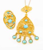 YELLOW METAL FILIGREE TURQUOISE PENDANT, stamped '750', on gold chain stamped '750', with matching