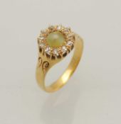 DIAMOND & CABOCHON GREEN STONE CLUSTER RING, central green stone bordered with old-cut round