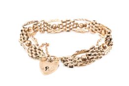 9CT GOLD GATE BRACELET, brick and ball link, heart shape padlock stamped '9ct', safety chain, 17.