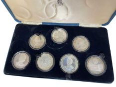 QUEEN MOTHER 80TH BIRTHDAY 7-COIN SILVER PROOF CROWN SET, 1980, six weighing 28.276g, one weighing