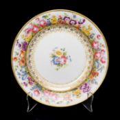 SWANSEA PORCELAIN PLATE, 1815-17, London decorated with a border of densely clustered flowers