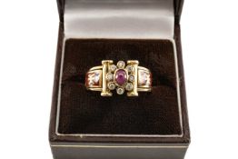 14K RUBY AND ENAMEL DRESS RING, floral cluster setting above enamelled shoulders with character