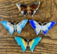 FOUR ENAMELLED STERLING SILVER BUTTERFLY BROOCHES, 50mms, each one weighing approx. 8.5gms, all with