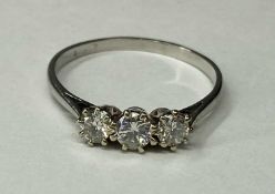 DIAMOND THREE-STONE RING, brilliant cut stones totalling approx. 0.55cts, set in platinum, size Q,